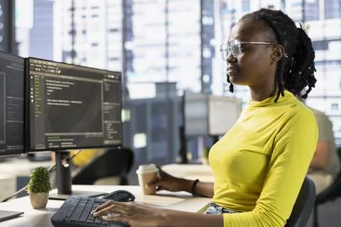 Back end developer managing cloud computing resources 写真素材