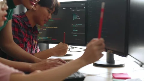 Back end software developer engineer writing code. Burgeoning Stock Footage 263485216