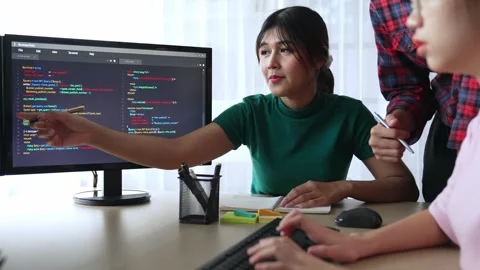 Back end software developer engineer writing code. Burgeoning Stock Footage 264176478