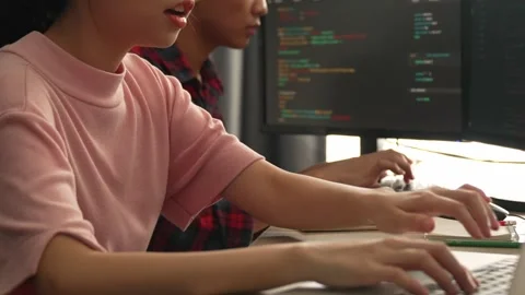 Back end software developer engineer writing code. Burgeoning Stock Footage 269615121