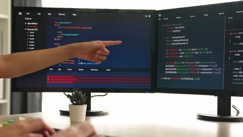 Back end software developer engineer writing code. Burgeoning Stock Footage 270176033