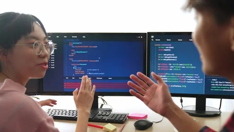 Back end software developer engineer writing code. Burgeoning Stock Footage 270500065