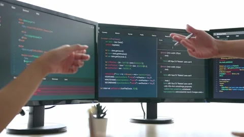Back end software developer engineer writing code. Burgeoning Stock Footage 271582173