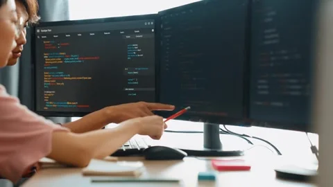 Back end software developer engineer writing code. Burgeoning Stock Footage 272666435
