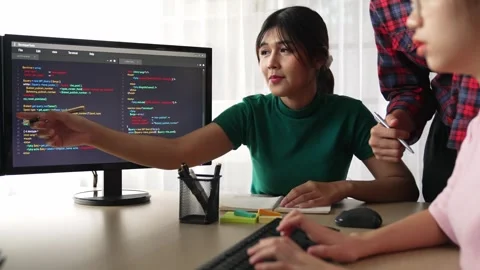 Back end software developer engineer writing code. Burgeoning Stock Footage 273846535