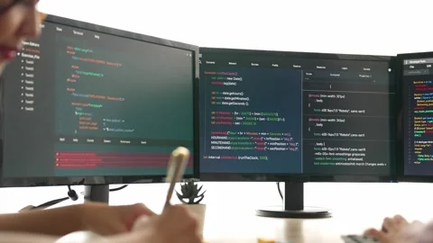 Back end software developer engineer writing code. Burgeoning Stock Footage 274226664