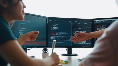 Back end software developer engineer writing code. Burgeoning Stock Footage 277024216