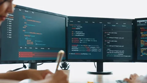 Back end software developer engineer writing code. Burgeoning Stock Footage 279509336