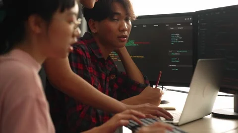 Back end software developer engineer writing code. Burgeoning Stock Footage 282843885