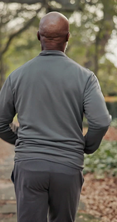 Back, exercise and running with black man outdoor on street for cardio training Stock Footage 340978976
