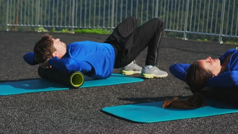 Back exercise with foam roller Stock Footage 150002077