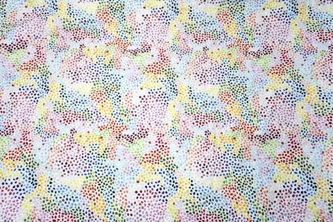 Back of a finished quilt, random dot pattern, wide, full frame shot. Stock Photos