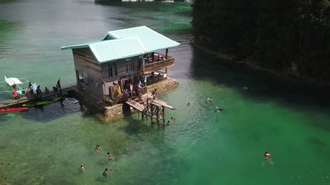 Back flip off diving board Sugba Lagoon 4k 動画素材 104019795