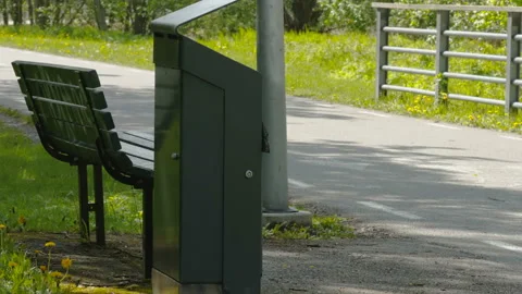 The back of the garbage bin on the side of the road in Estonia Stock Footage 197851984