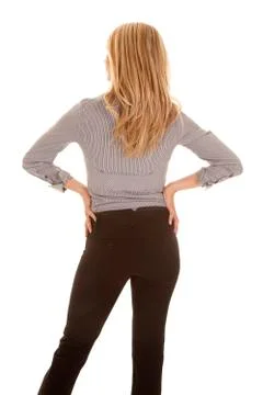 Back hands on hips woman Stock Photos