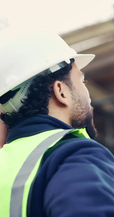 Back, hard hat and thinking with man on construction site for engineering or Stock Footage 336800008