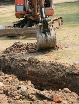 Back-hoe in operation Stock Photos