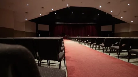 Back of Large Empty Auditorium Filled With Chairs Wide Angle Video stock 267436675