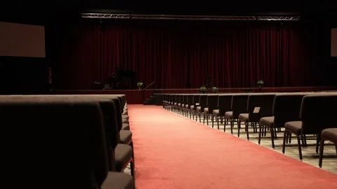 Back of Large Empty Auditorium Filled With Chairs Tracking Vídeo Stock 267436691
