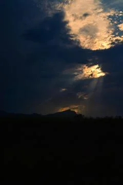 Back light, overcast sky, sunlight, through the clouds. Stock Photos