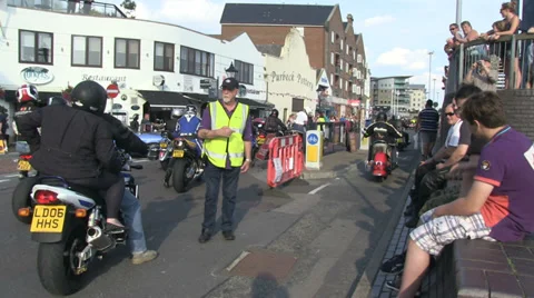Back of lots of motorbikes passing 2 Stock Footage 37025609