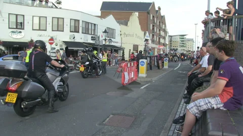 Back of lots of motorbikes passing 3 Stock Footage 37026558