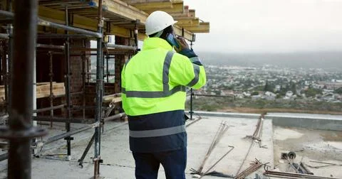 Back, man and engineer at site with phone call, discussion and inspection f.. Stock Photos