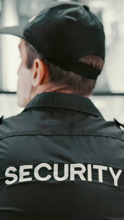 Back, man and security guard in control room for surveillance, observation or Stock Footage 335293462