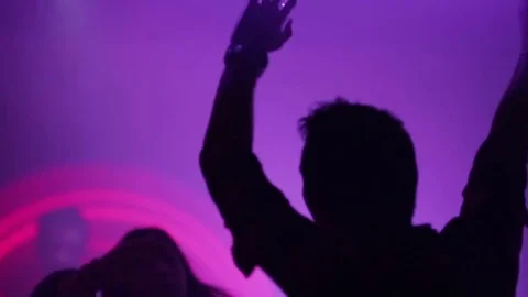 Back Of Man Dancing In Crowd In Night Club During Big Party Stock Footage 71971384