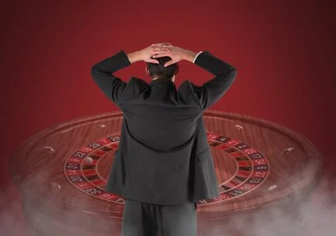 Back of Man Looking at 3d roulette Stock Photos