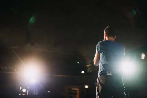 Back of a man on the stage from behind Stock Photos
