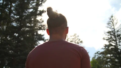 Back of Man's Head Outside Revealing Sun Glare Video stock 125757323