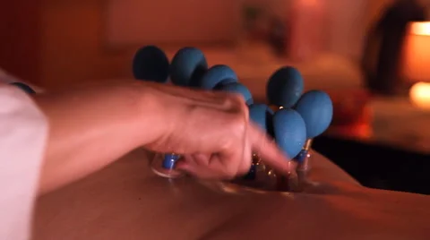 Back massage, magnetic cans Stock Footage 49669062