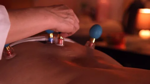 Back massage, magnetic cans Stock Footage 49669096