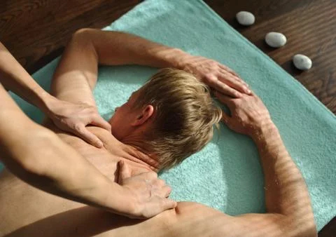 Back massage Stock Photos