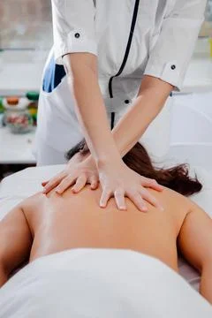 Back massage Stock Photos