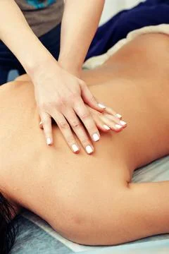 Back massage Stock Photos
