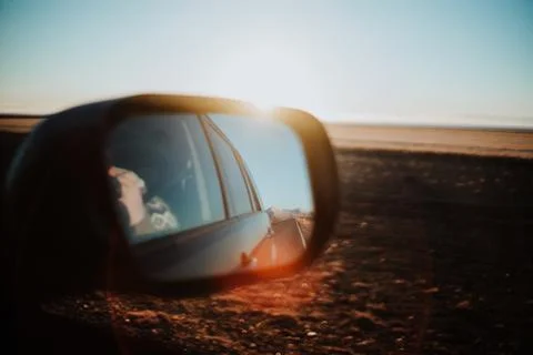 Back mirror at sunset Stock Photos