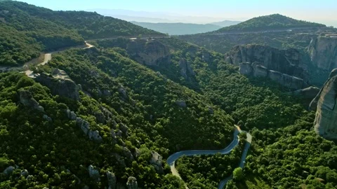 Back moving flying over amazing valley famous natural mountain Meteora in Stock Footage 97665824