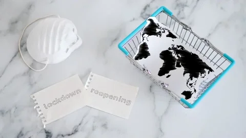 Back to normal after covid-19, ahnd placing lockdown versus reopening signs n Stock Footage 131503460