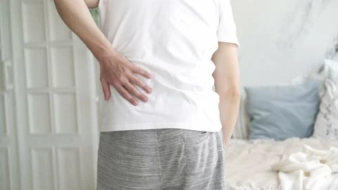 Back pain, kidney inflammation, man suffering from backache at home Stock Footage 168568902