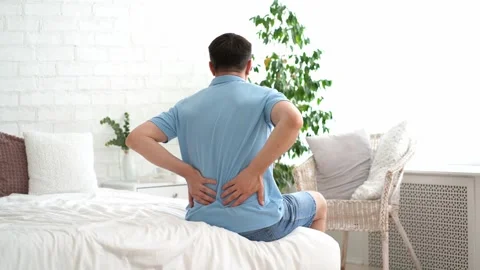 Back pain, kidney inflammation, man suffering from backache at home Stock Footage 280933144