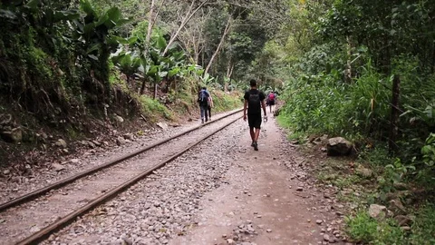 Back pakers along the train tracks Video stock 86760805