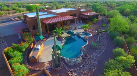 Back pan over pool Superstition mountain home AZ.mp4 Stock Footage 54253733