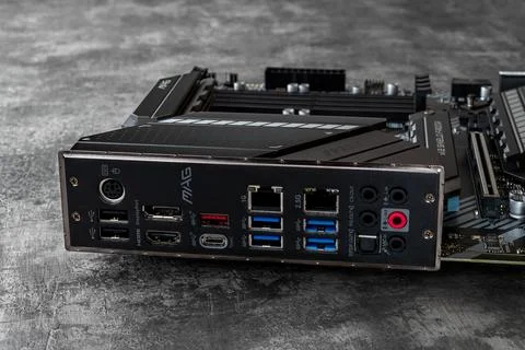 Back panel ports of MSI mag Z490 Tomahawk gaming motherboard close-up. Stock Photos