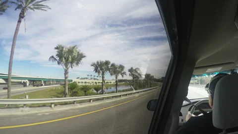 Back passenger point of view of driviing along a motorway Stock Footage 153652546