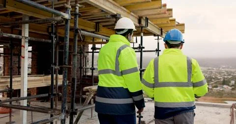 Back, people and engineer at site for construction, inspection and planning.. Foto stock