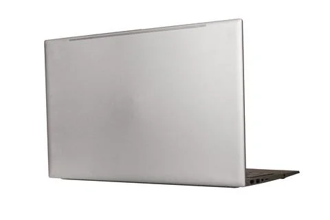 Back perspective view of open laptop computer showing silver metallic lid c.. Stock Photos