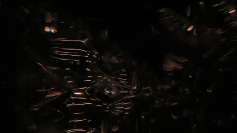 Back plate.  Light reflected through glass of water. Vidéo 112780206