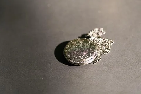 Back of a Pocket watch closeup. Selective Focus Stock Photos